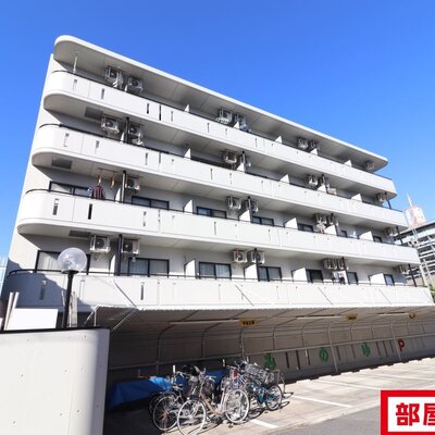 
						5階建てマンション。